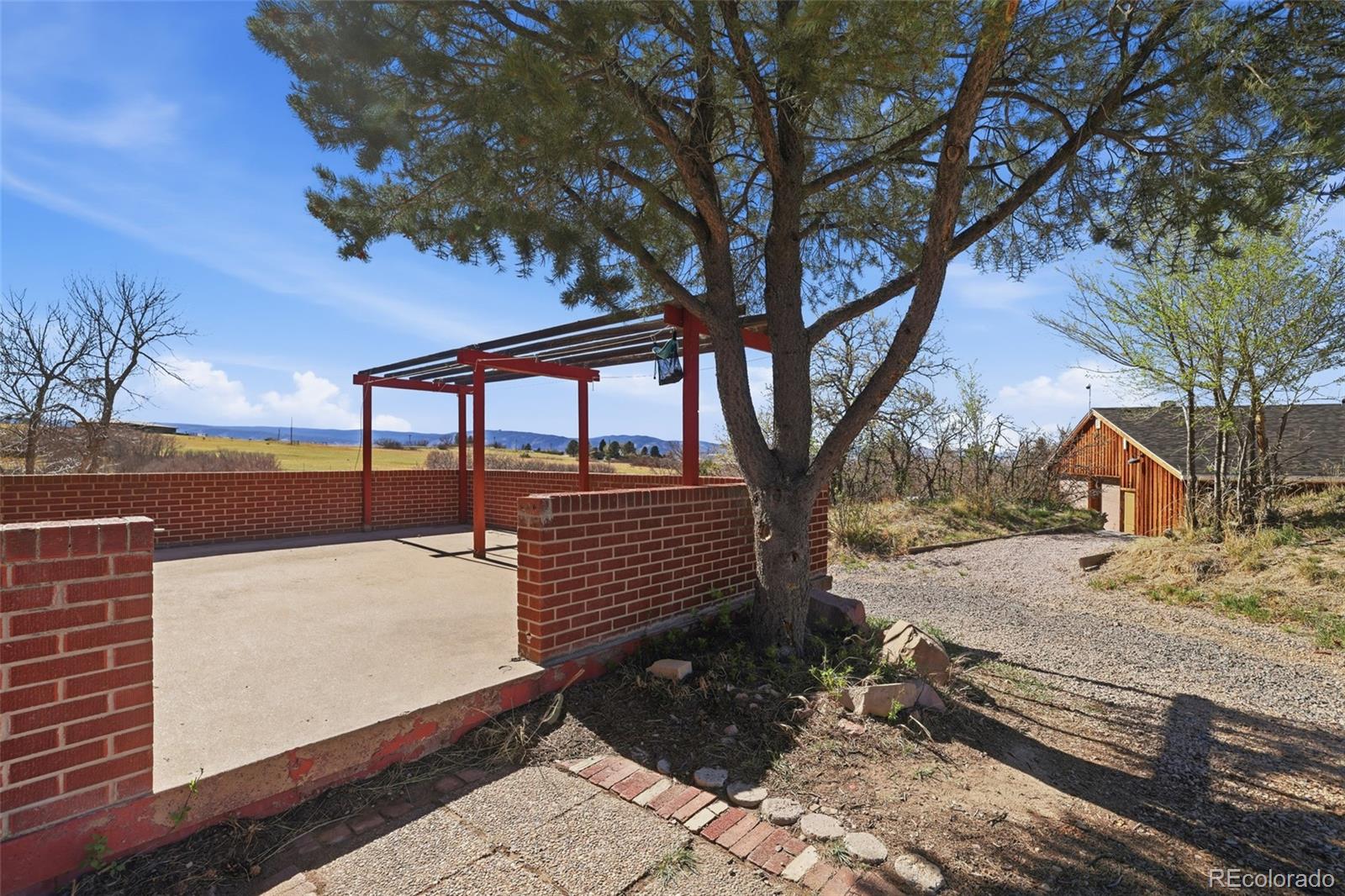 2097 West Wolfensberger Road Castle Rock, CO 80109 - Photo 39 of 48 a view of a backyard of the house