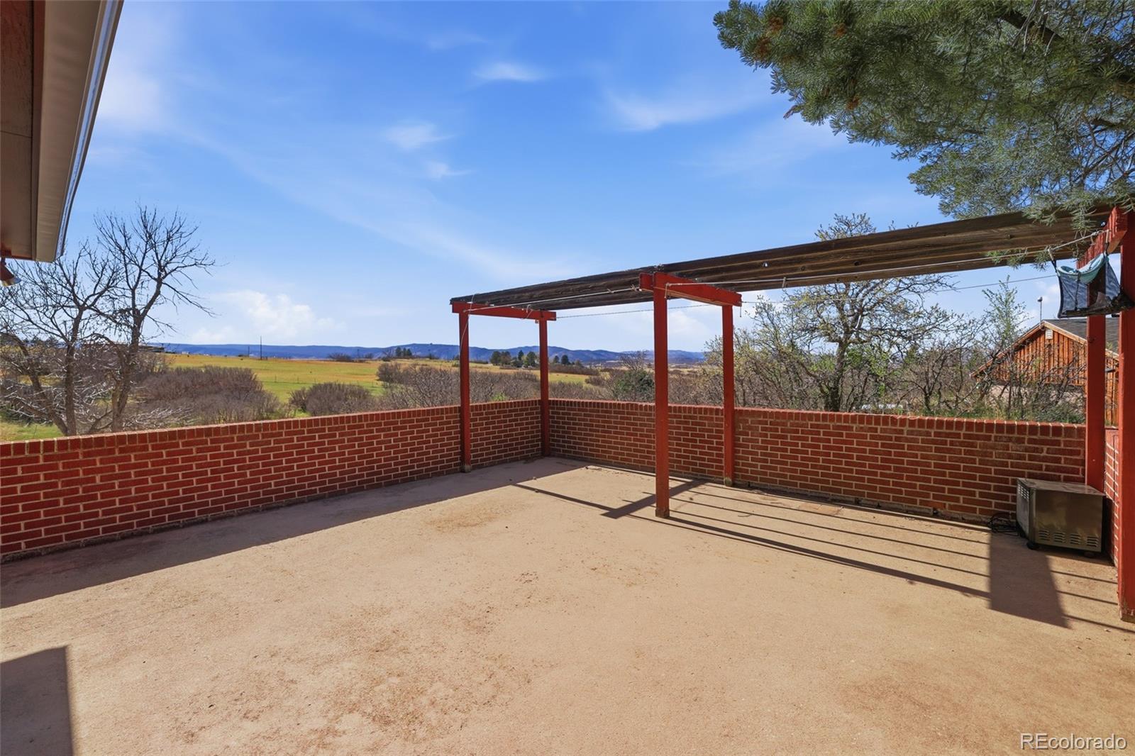 2097 West Wolfensberger Road Castle Rock, CO 80109 - Photo 40 of 48 a view of outdoor space with seating area