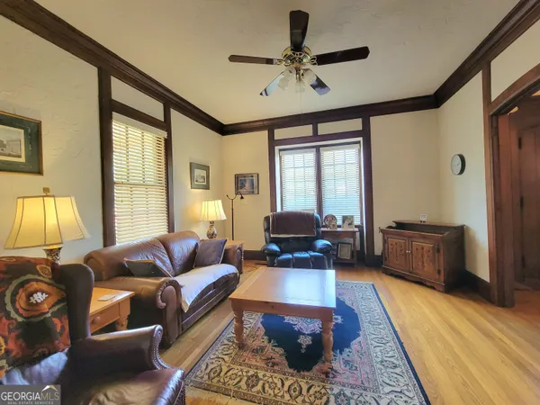 a living room with furniture and a window