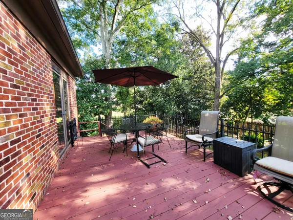 a view of a trees in front of a house