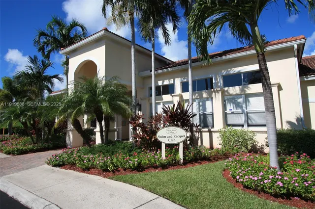 a view of an outdoor space and tennis court