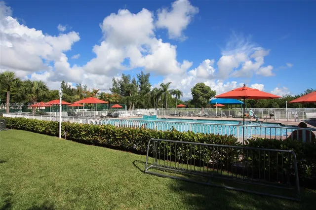a view of a lake with houses in outdoor space