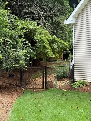 a view of a garden with a tree