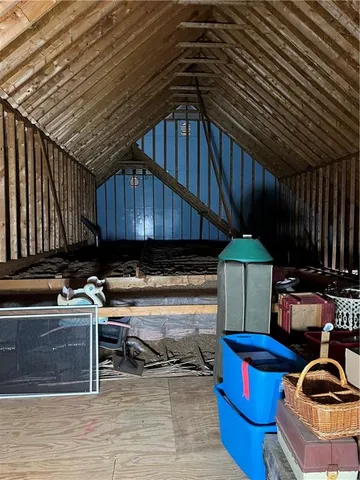 a kitchen with table and chairs