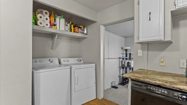 a utility room with dryer and washer