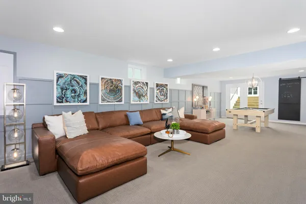 a living room with furniture and a couch