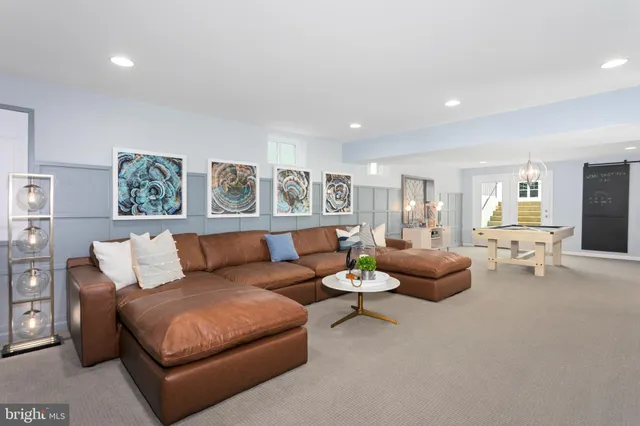 a living room with furniture and a couch