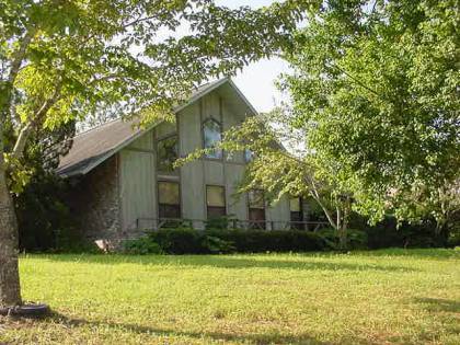 545 Ridge Lake Road Crestview, FL 32536 - Photo 1 of 1 a front view of house with yard and trees