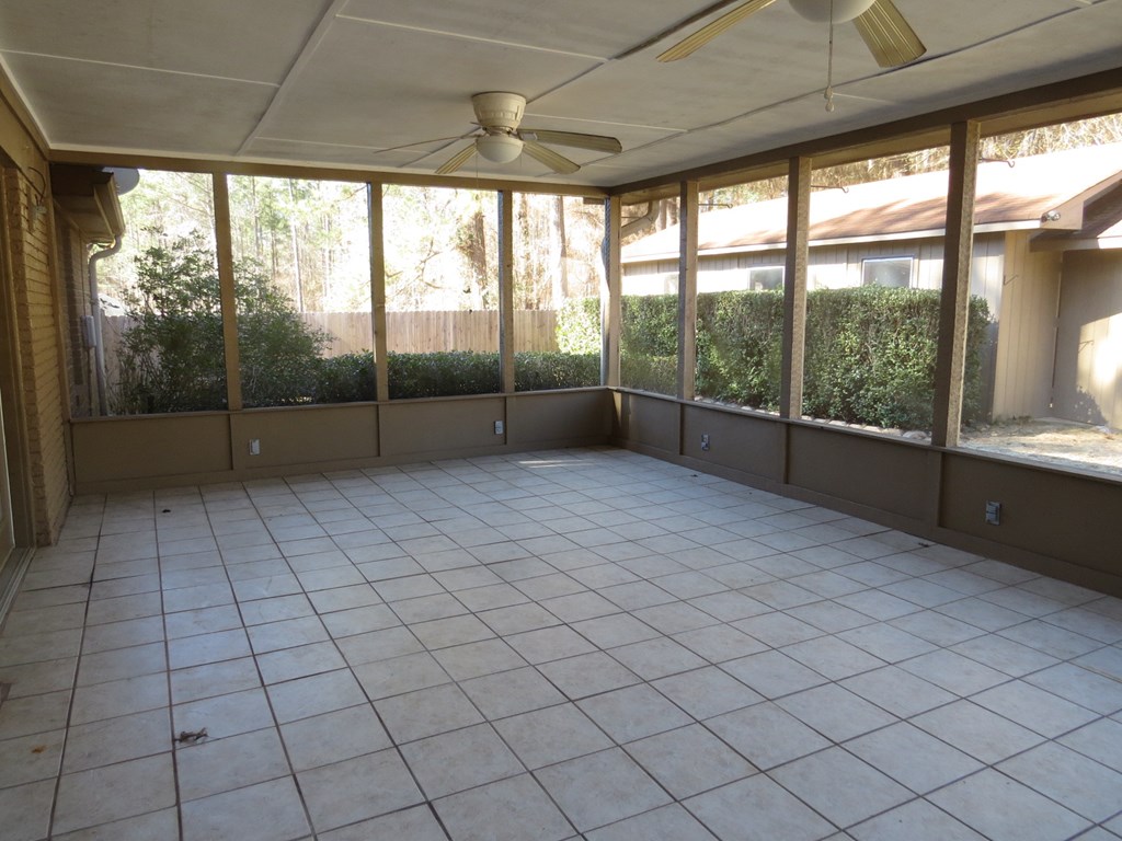 8975 Moore Road Columbus, GA 31904 - Photo 26 of 36 Screened porch with tile flooring