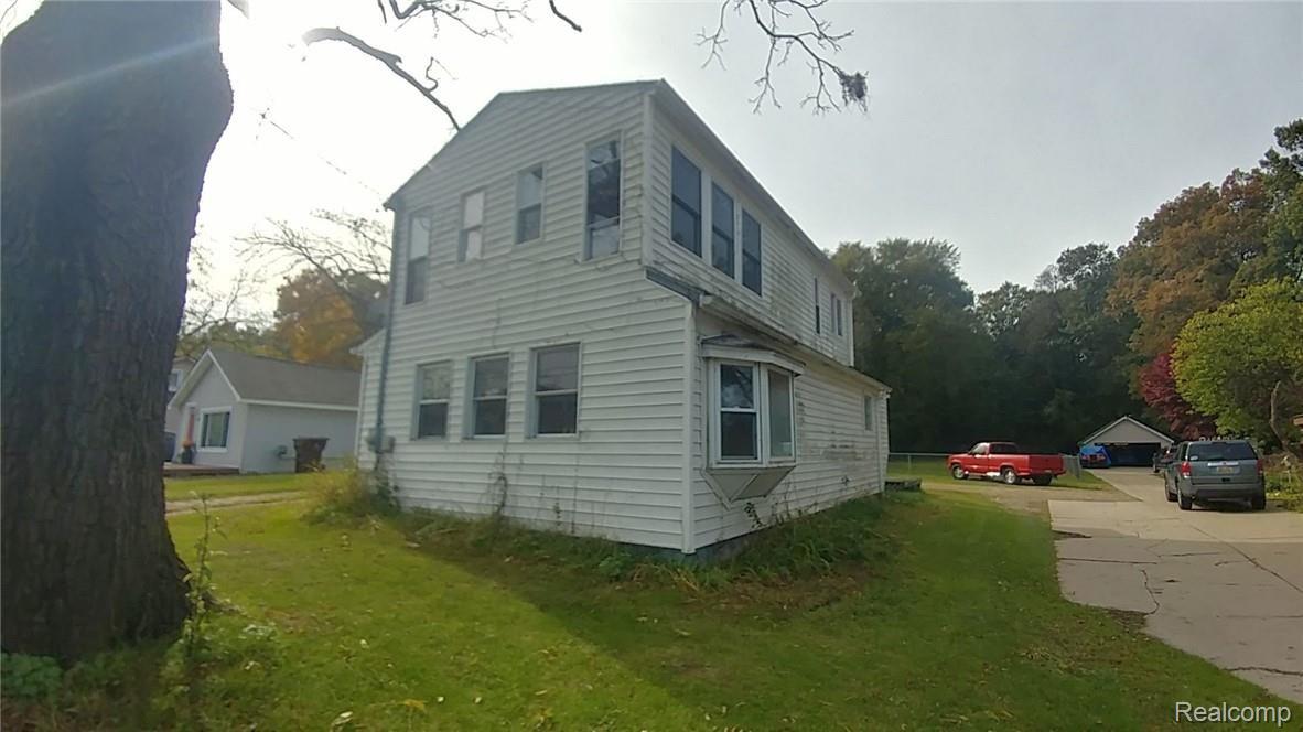 3486 Newton Road Commerce Township, MI 48382 - Photo 6 of 15 right elevation.jpg