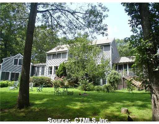 39 Station Scotland Court Windham, CT 06280 - Photo 1 of 1 a front view of a house with a yard