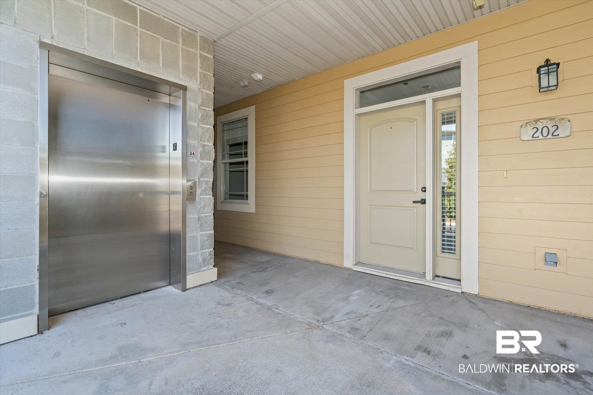 1430 Regency Road, Unit C202 Gulf Shores, AL 36542 - Photo 2 of 27 Elevator right outside your door