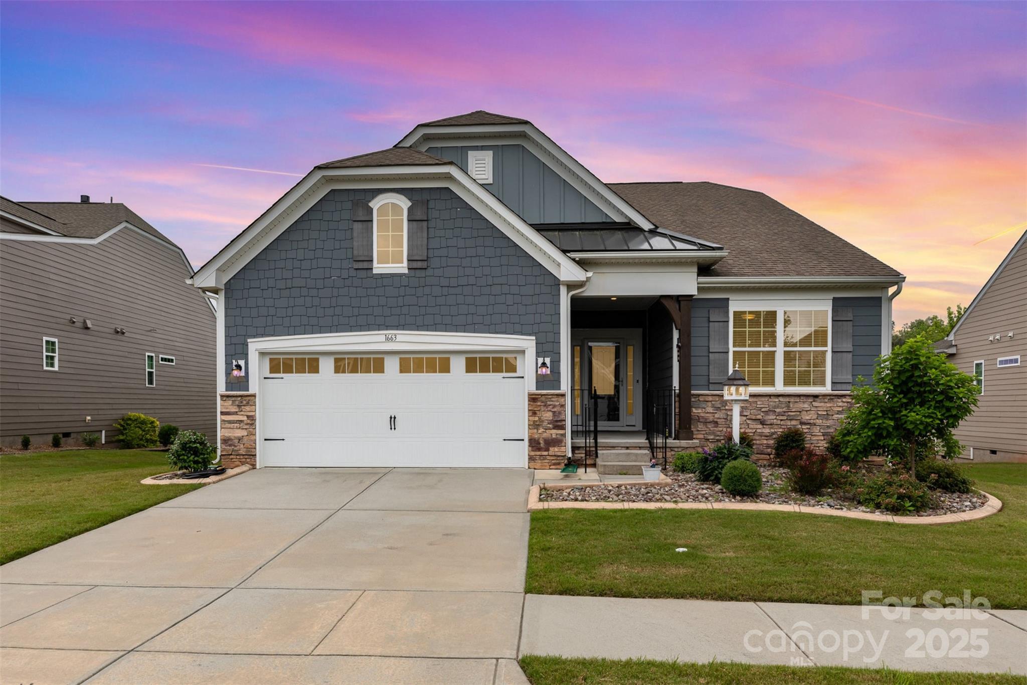 1663 Tranquility Boulevard Lancaster, SC 29720 - Photo 1 of 42 a front view of a house with a yard