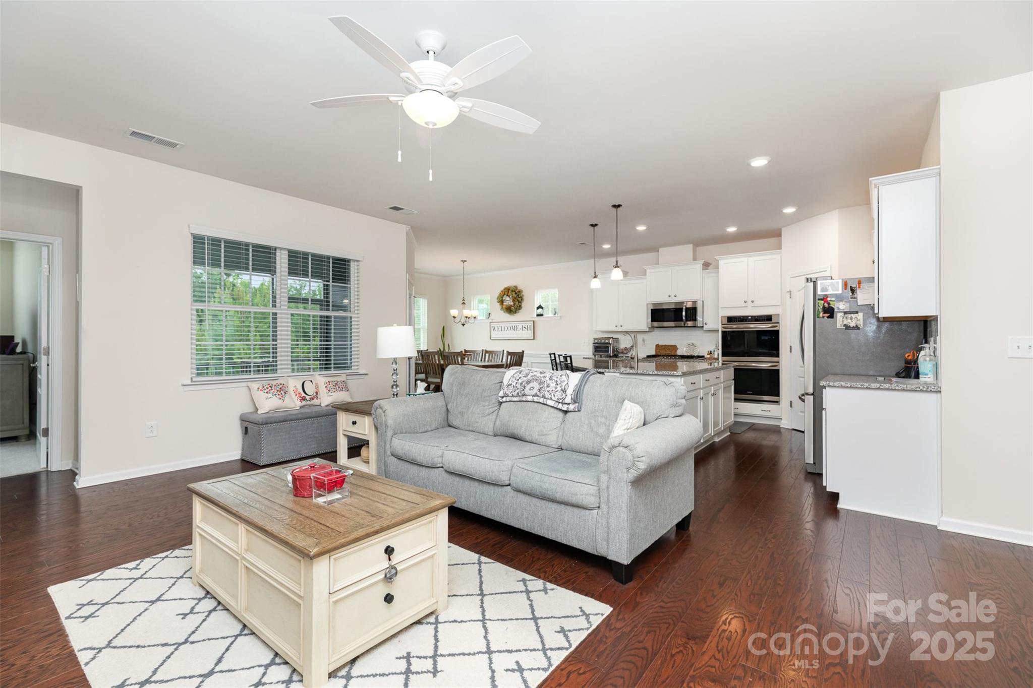 1663 Tranquility Boulevard Lancaster, SC 29720 - Photo 12 of 42 a living room with furniture and a large window