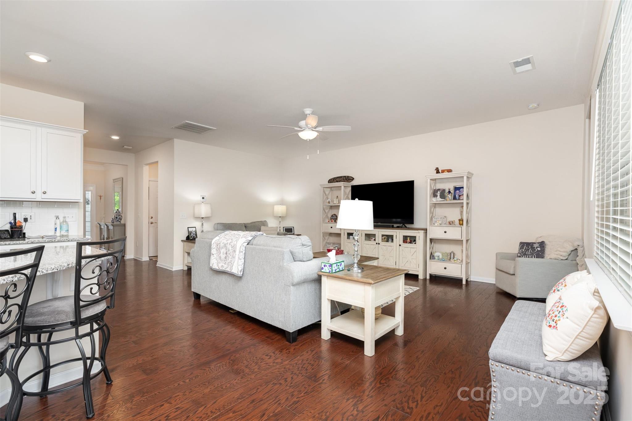 1663 Tranquility Boulevard Lancaster, SC 29720 - Photo 14 of 42 a living room with furniture couches and a flat screen tv