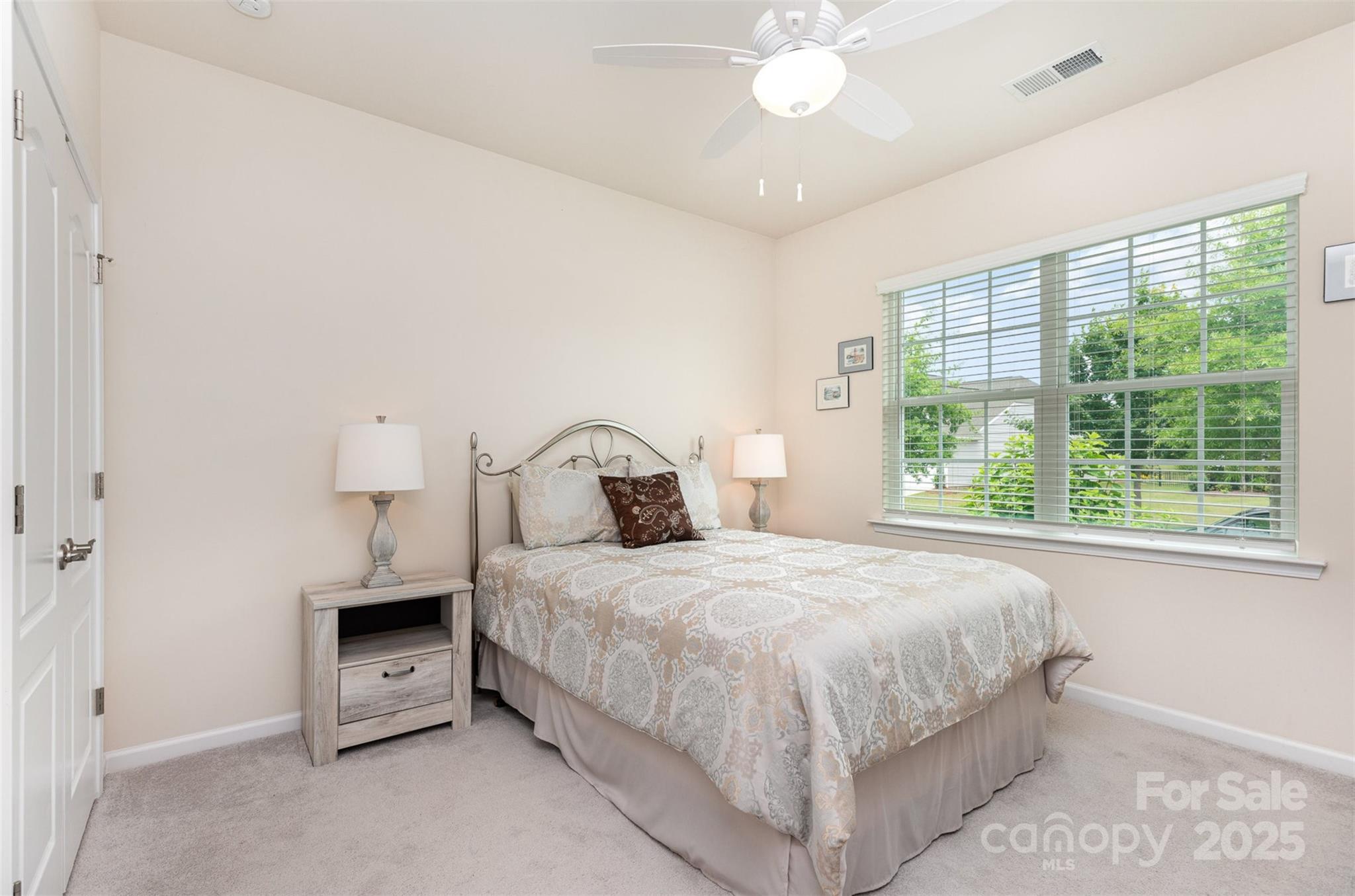 1663 Tranquility Boulevard Lancaster, SC 29720 - Photo 18 of 42 a bedroom with a bed and a window