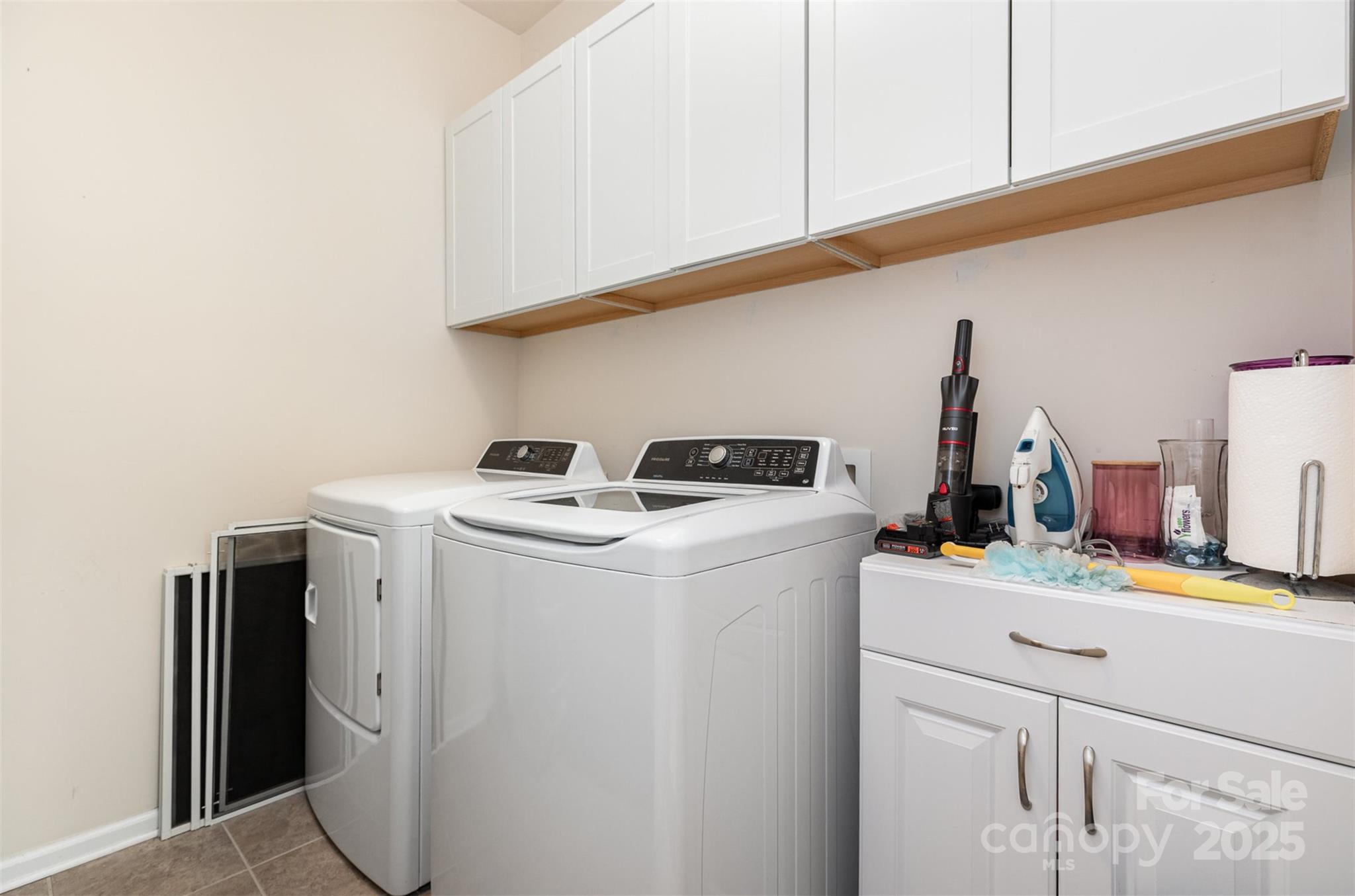 1663 Tranquility Boulevard Lancaster, SC 29720 - Photo 21 of 42 a utility room with dryer and washer