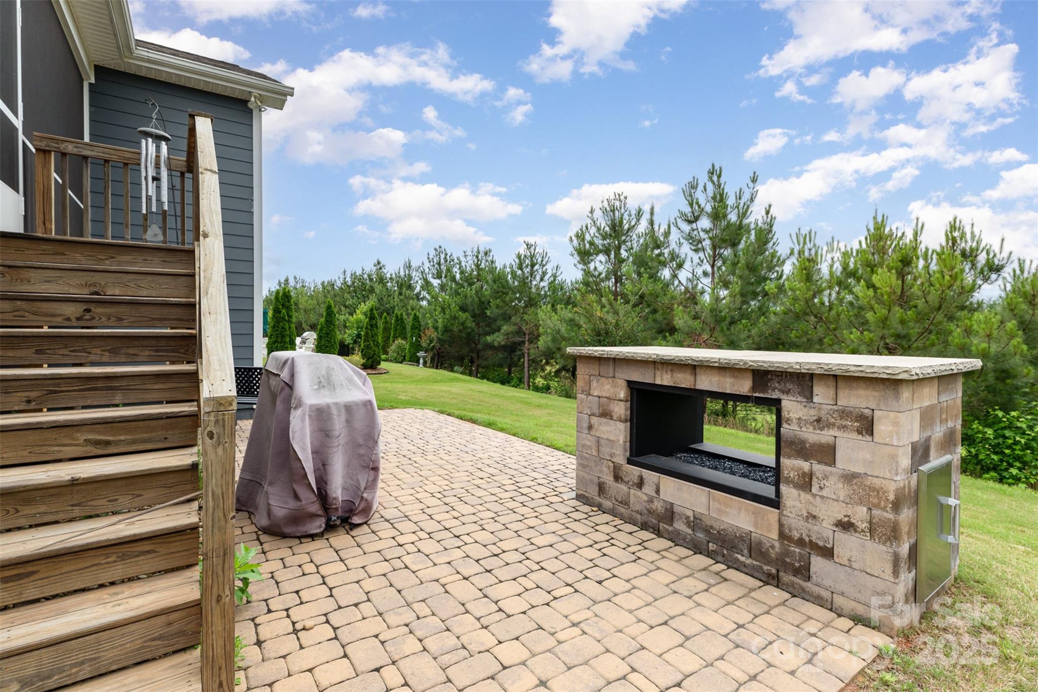 1663 Tranquility Boulevard Lancaster, SC 29720 - Photo 29 of 42 a view of a patio with a table and chairs