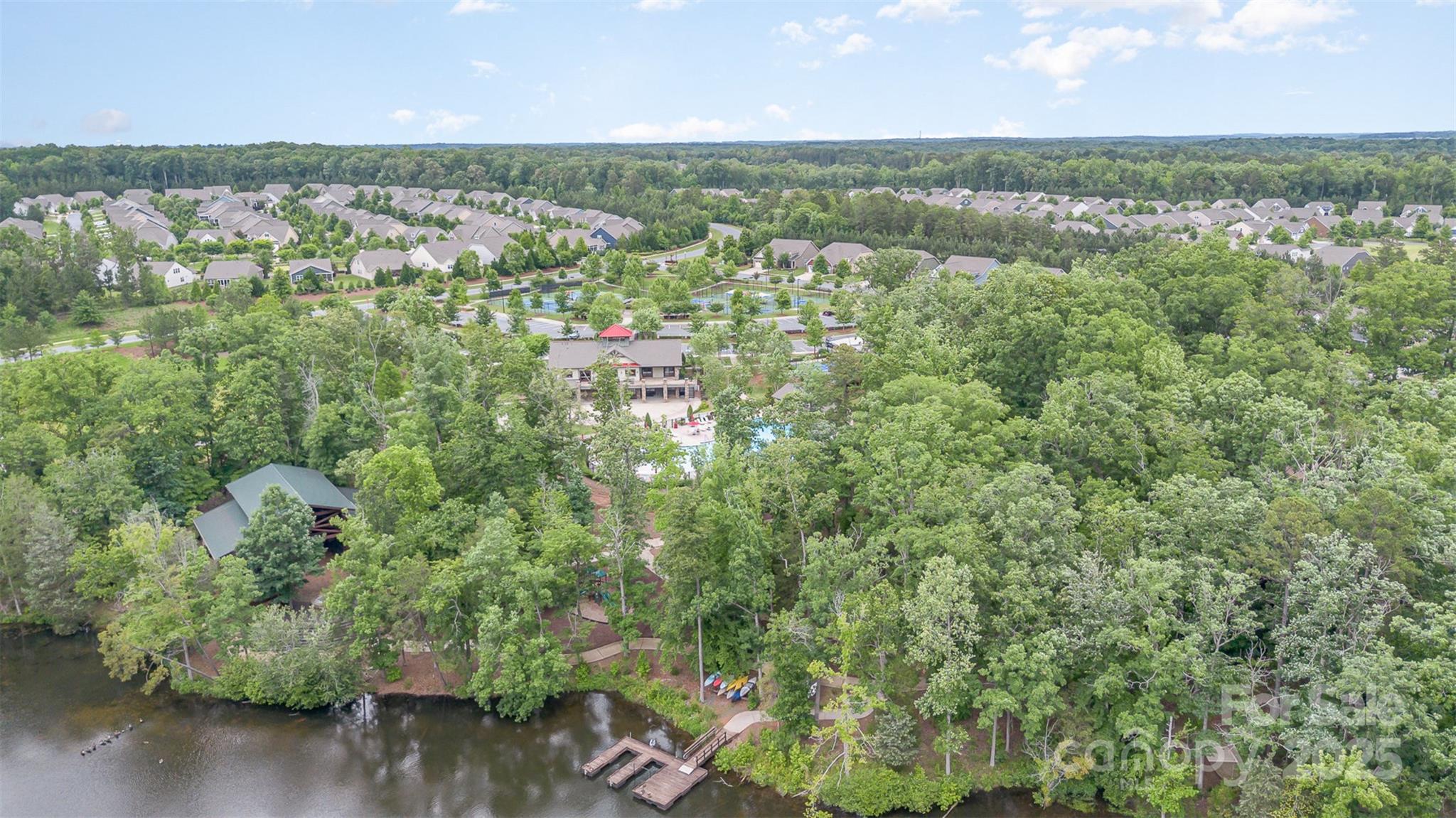 1663 Tranquility Boulevard Lancaster, SC 29720 - Photo 39 of 42 an aerial view of residential houses with outdoor space and trees