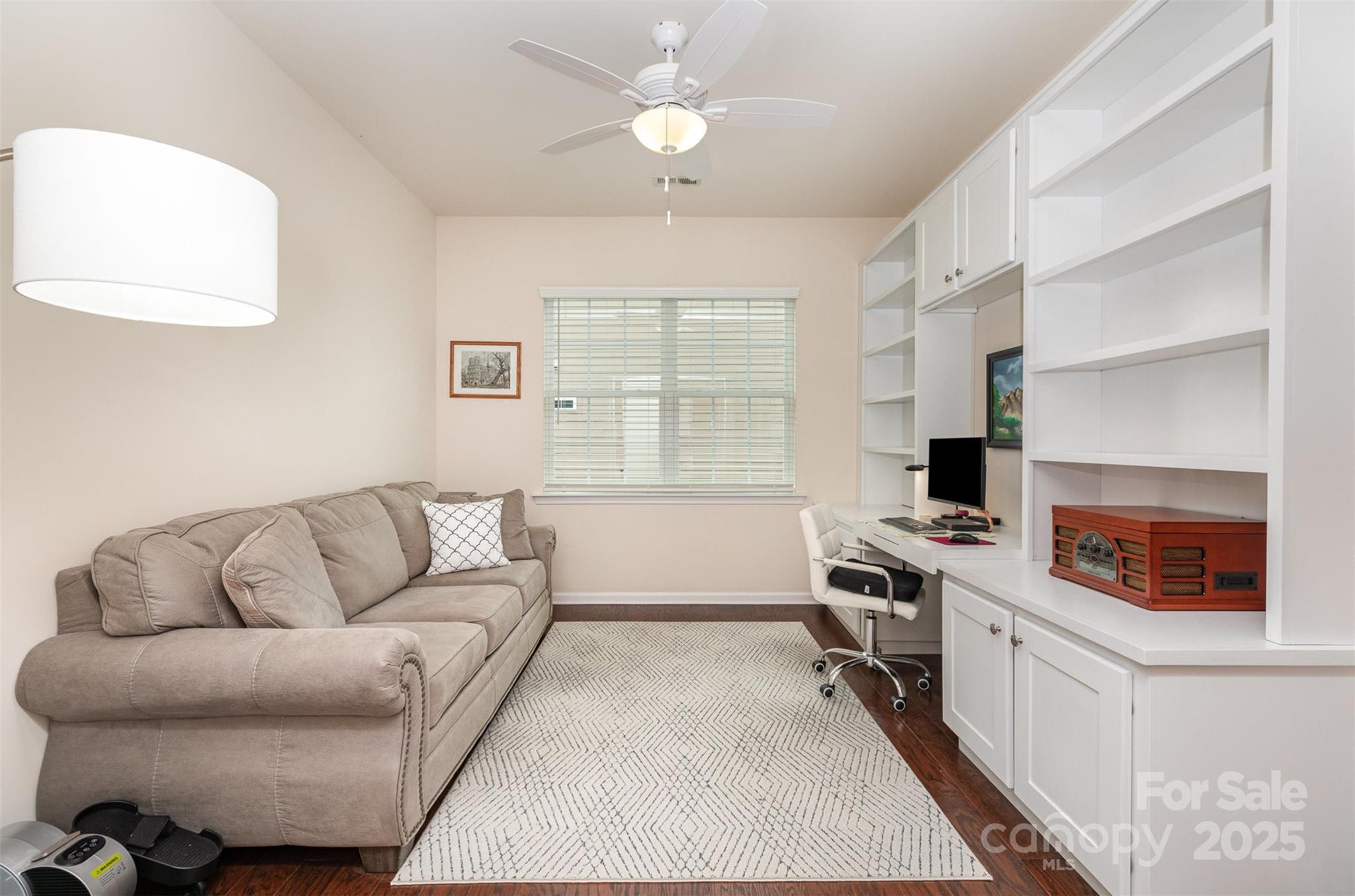 1663 Tranquility Boulevard Lancaster, SC 29720 - Photo 8 of 42 a living room with furniture and a flat screen tv