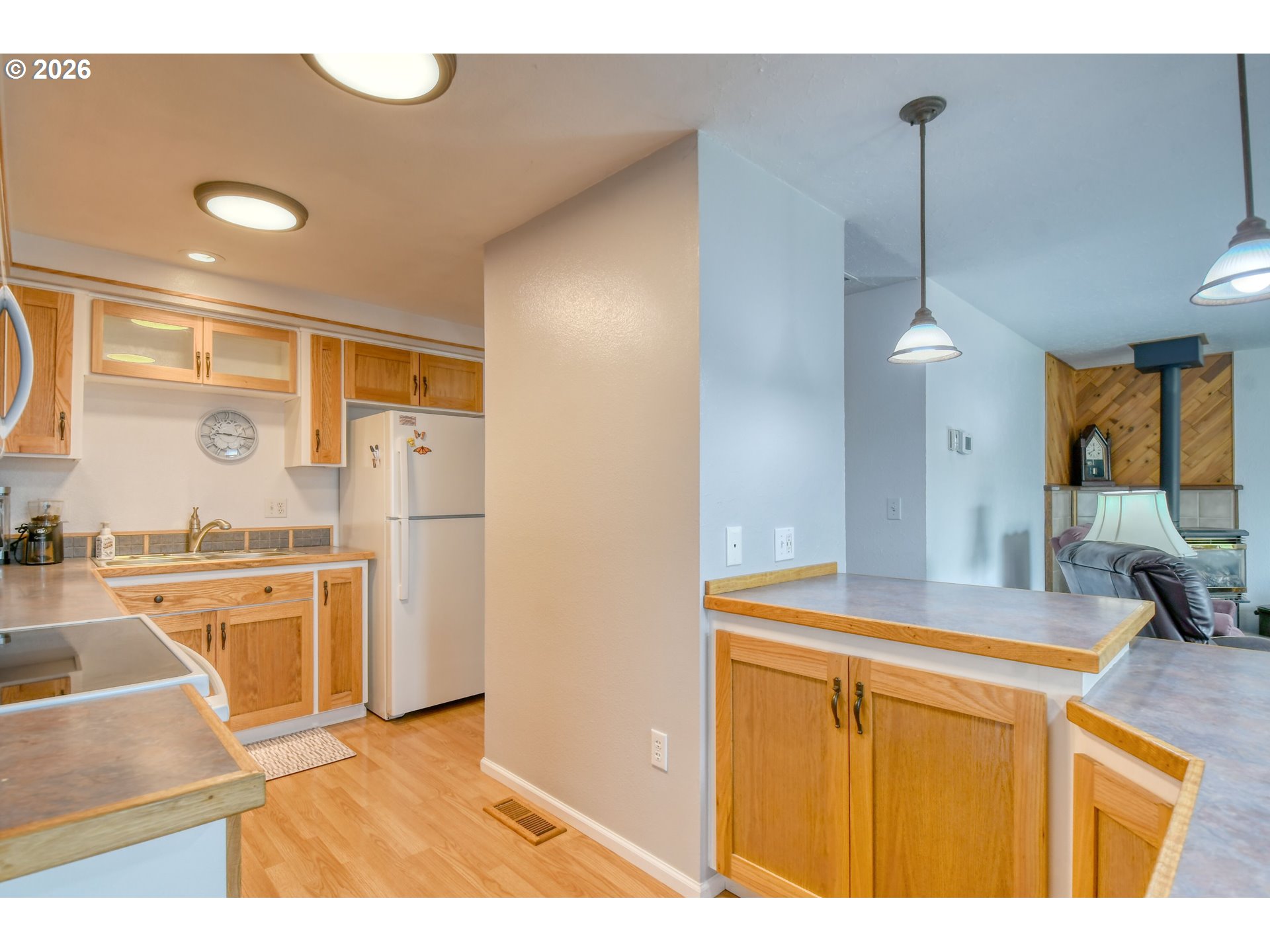 329 West Garfield Street Athena, OR 97813 - Photo 15 of 46 a kitchen with stainless steel appliances granite countertop a sink a stove and a refrigerator