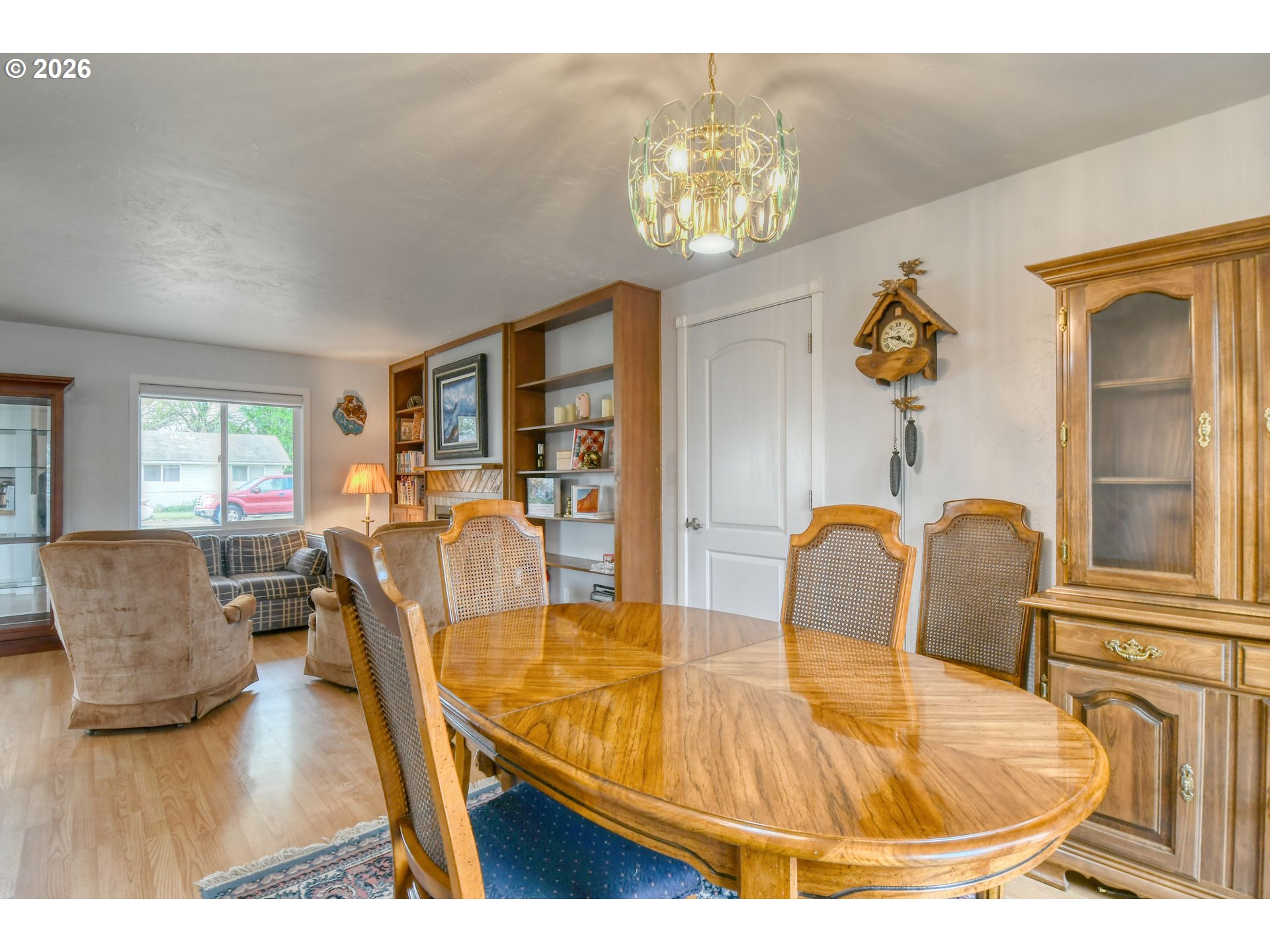 329 West Garfield Street Athena, OR 97813 - Photo 20 of 46 a dining room with furniture a chandelier and wooden floor