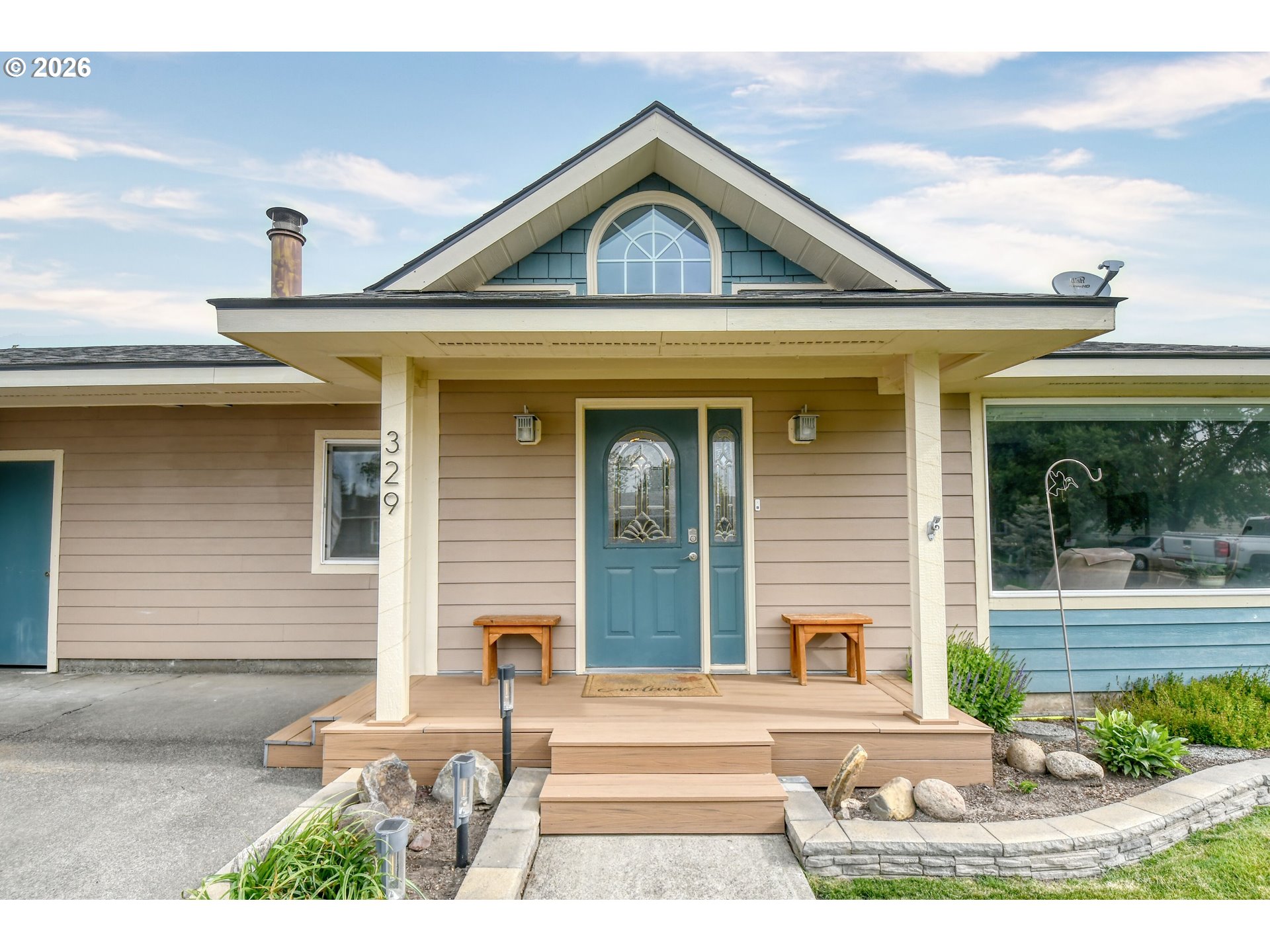 329 West Garfield Street Athena, OR 97813 - Photo 2 of 46 a front view of a house with garden