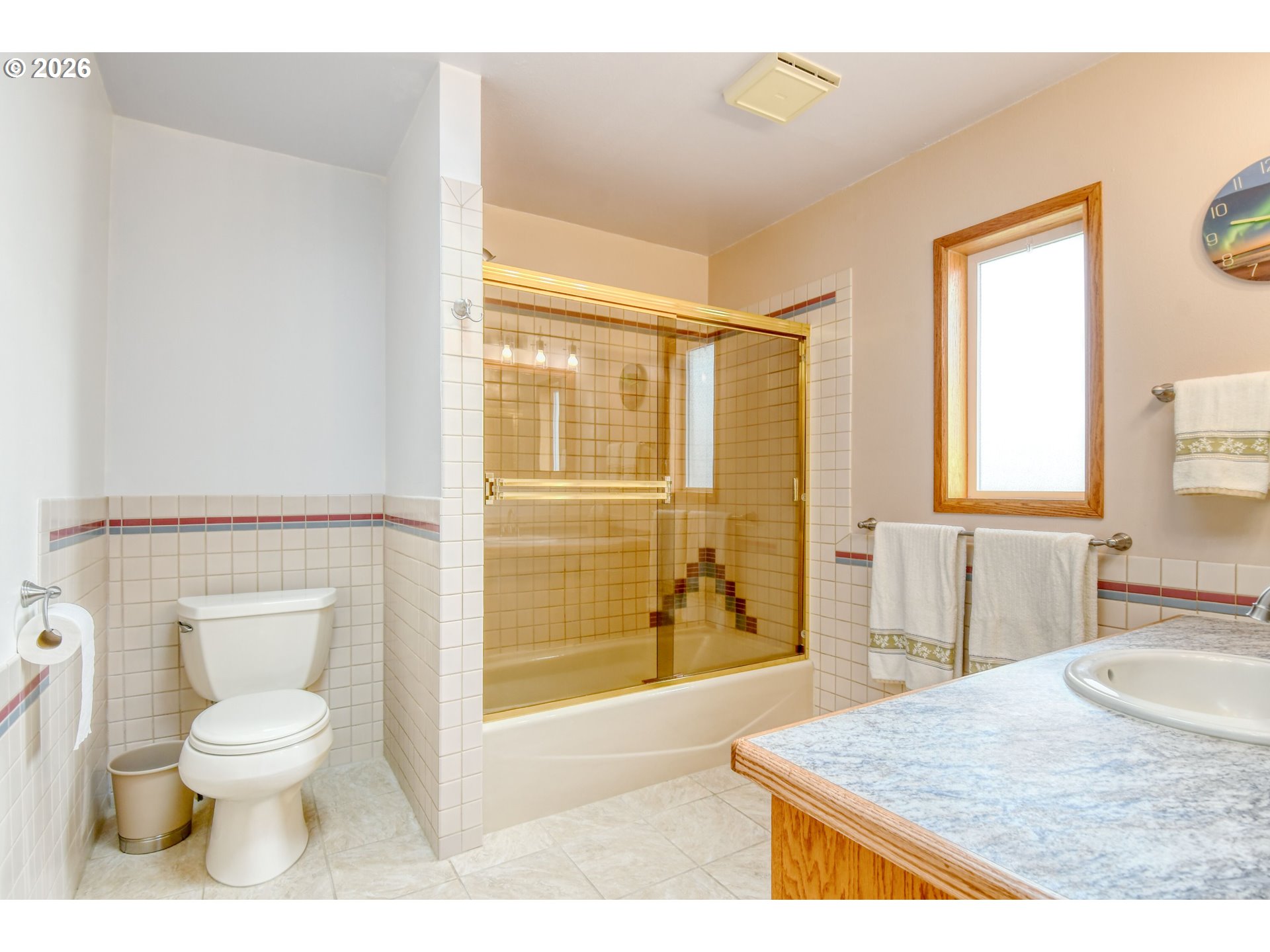 329 West Garfield Street Athena, OR 97813 - Photo 26 of 46 a bathroom with a granite countertop sink toilet and shower