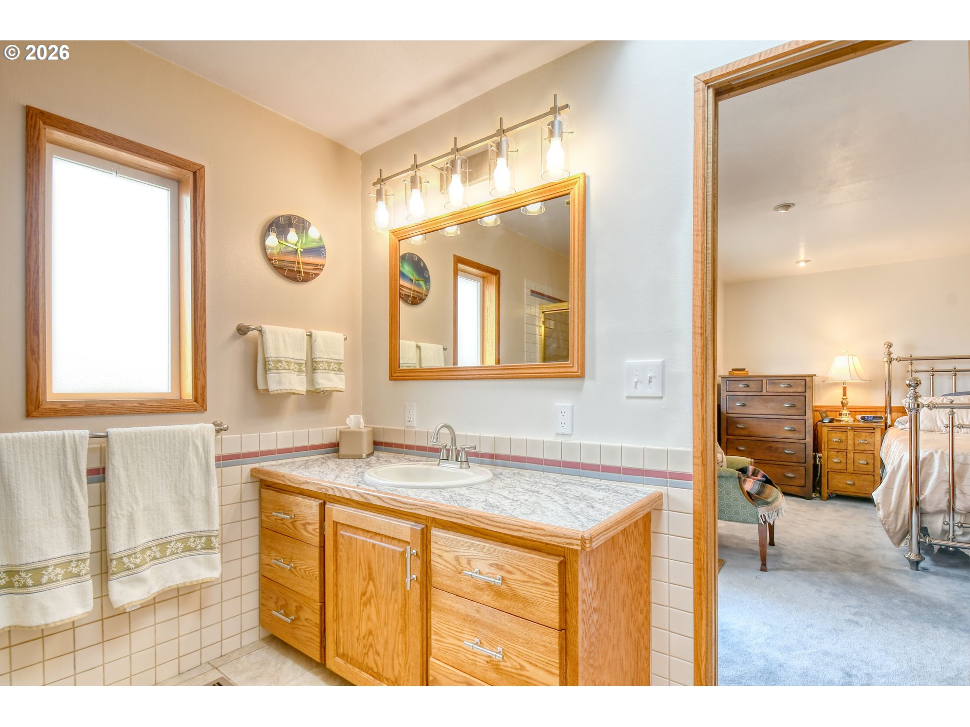 329 West Garfield Street Athena, OR 97813 - Photo 27 of 46 a bathroom with a sink vanity and a mirror