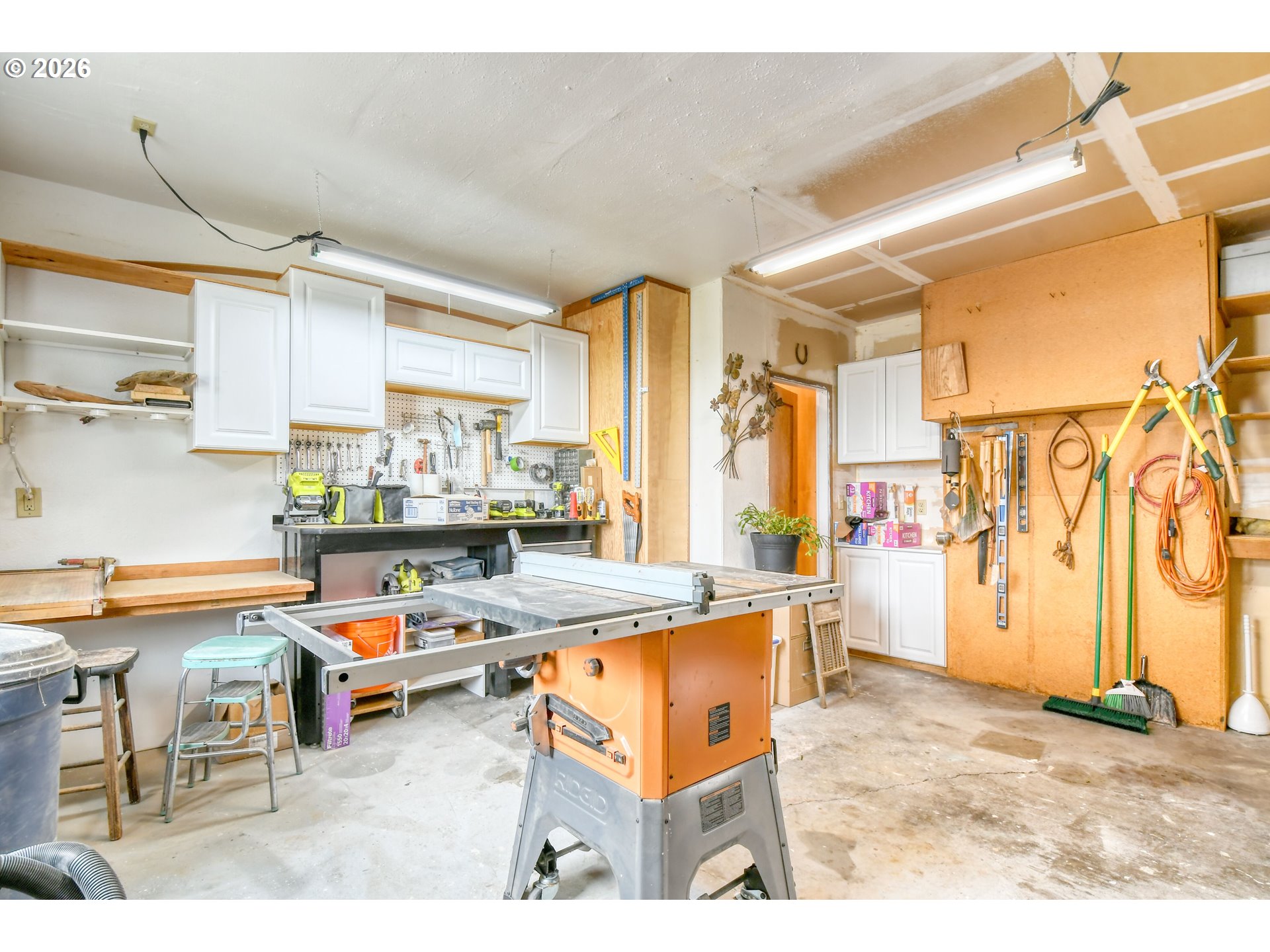 329 West Garfield Street Athena, OR 97813 - Photo 36 of 46 a room with stainless steel appliances kitchen island granite countertop furniture and a sink