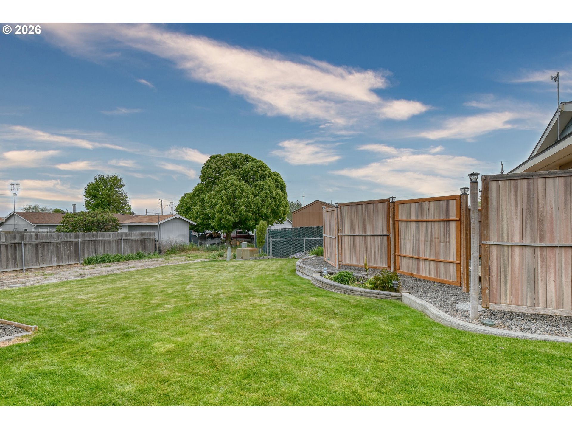 329 West Garfield Street Athena, OR 97813 - Photo 43 of 46 a view of a backyard with potted plants