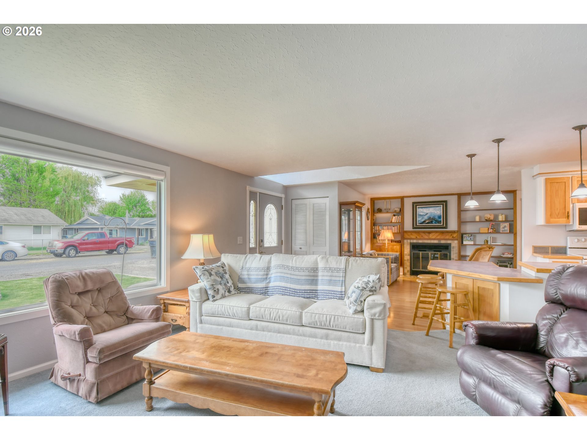 329 West Garfield Street Athena, OR 97813 - Photo 5 of 46 a living room with furniture and a large window
