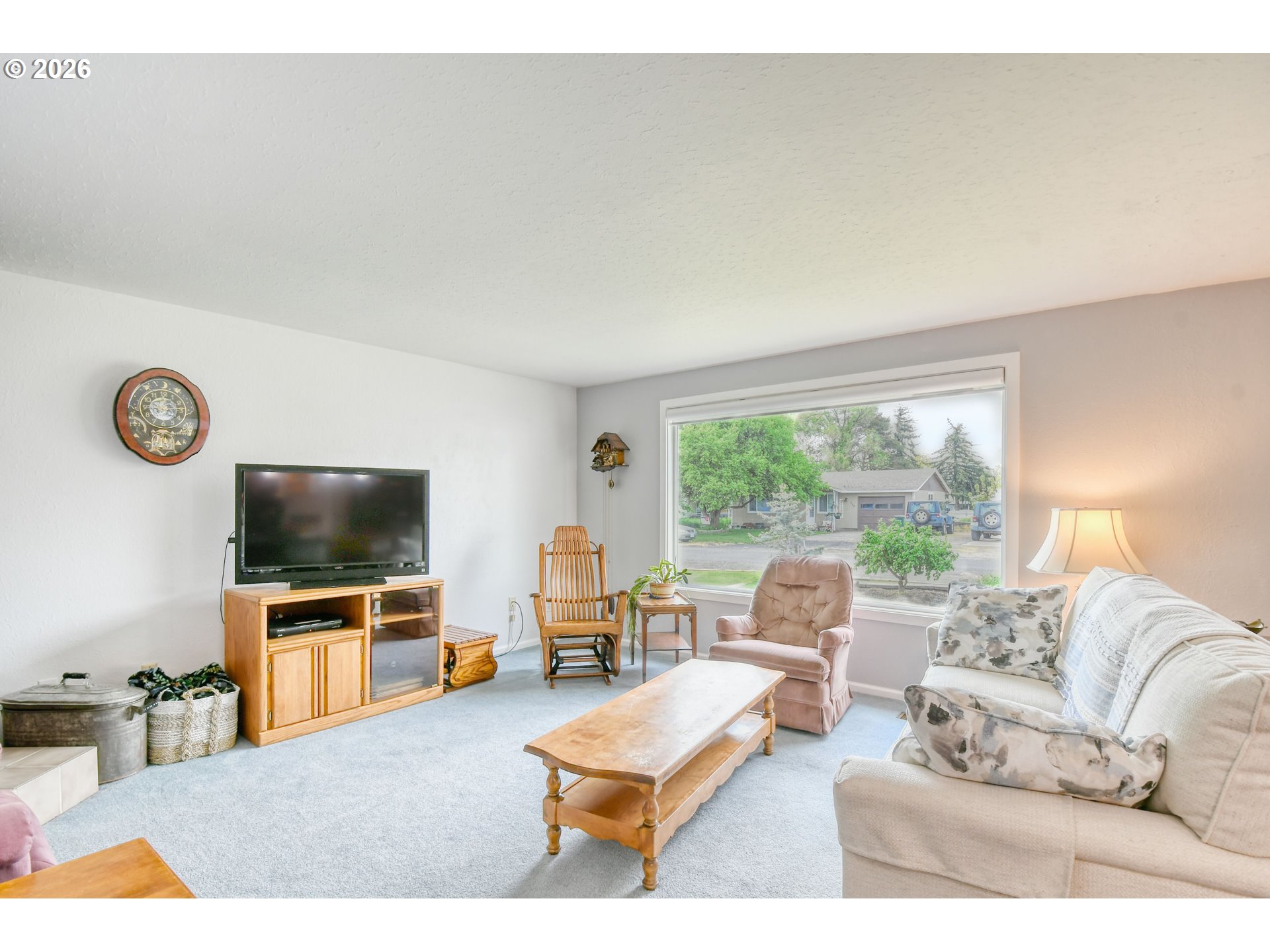 329 West Garfield Street Athena, OR 97813 - Photo 6 of 46 a living room with furniture and a flat screen tv