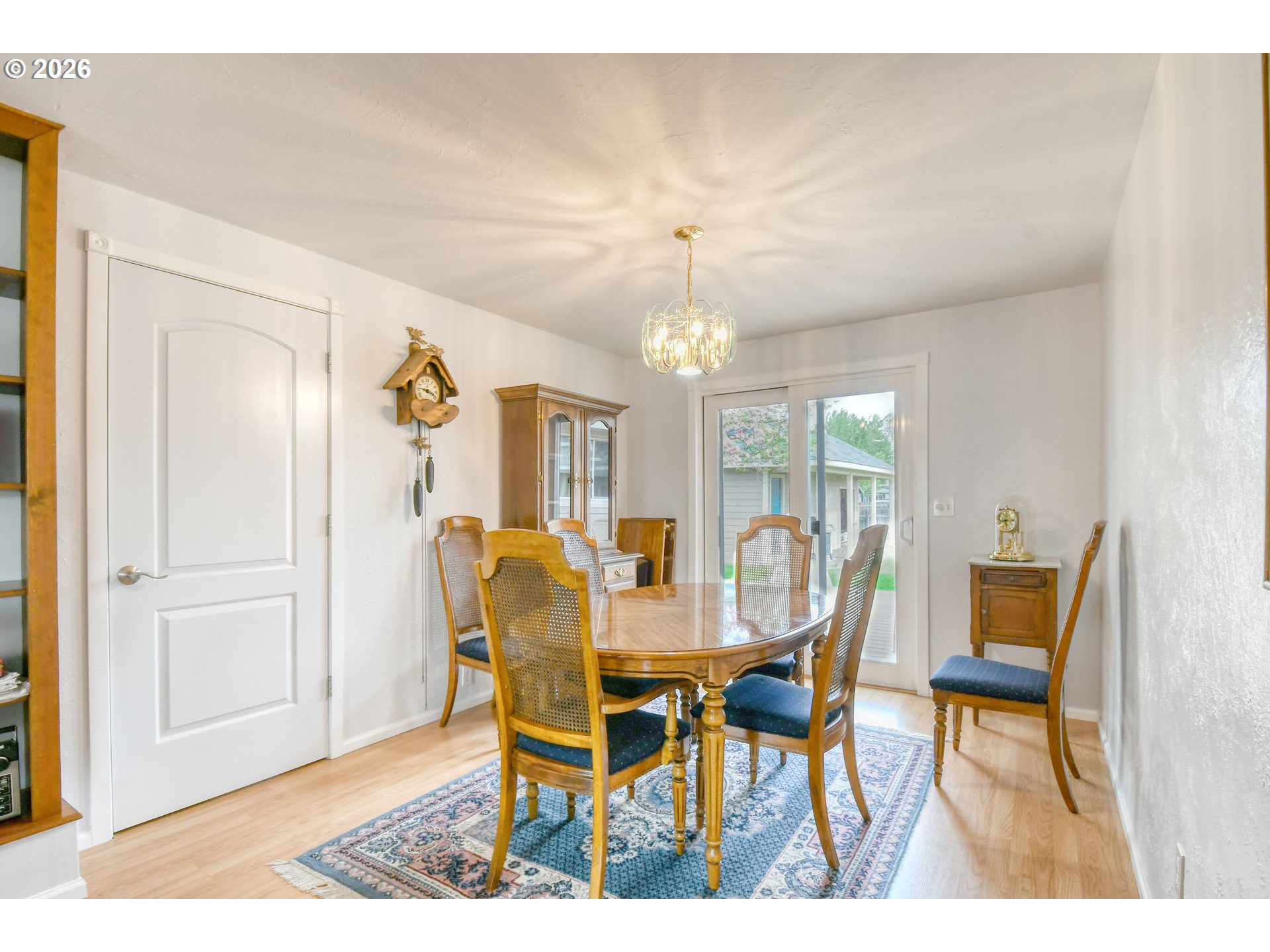 329 West Garfield Street Athena, OR 97813 - Photo 9 of 46 a view of a dining room with furniture wooden floor and chandelier