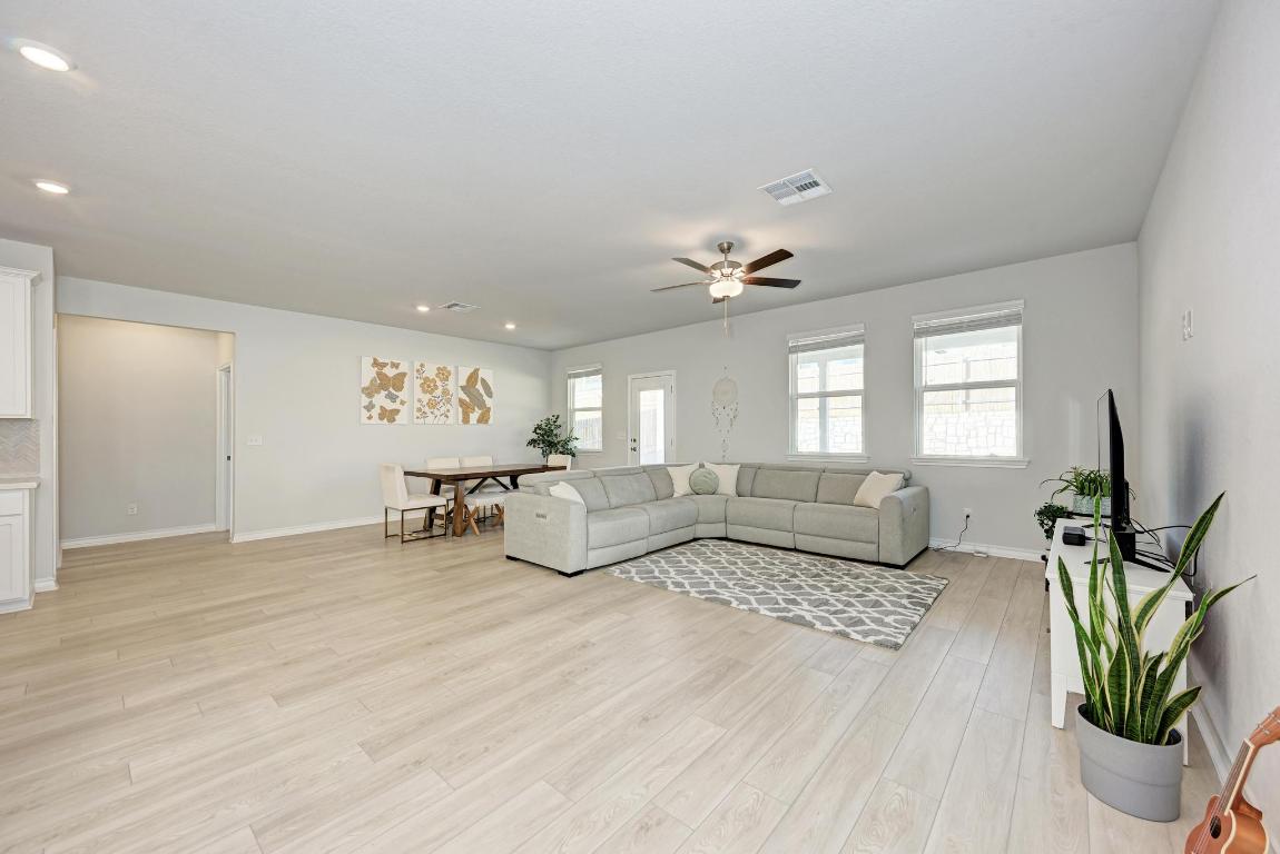 113 Rampart Loop Liberty Hill, TX 78642 - Photo 11 of 40 a living room with furniture