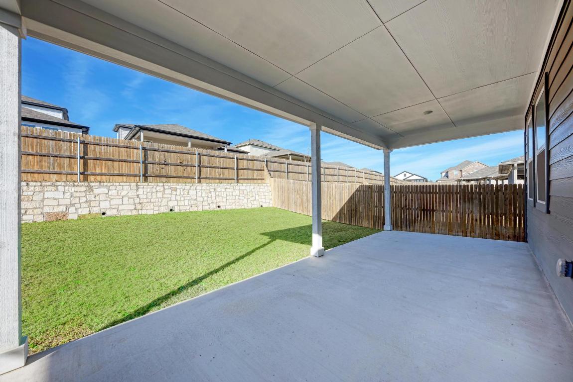 113 Rampart Loop Liberty Hill, TX 78642 - Photo 30 of 40 a view of a backyard