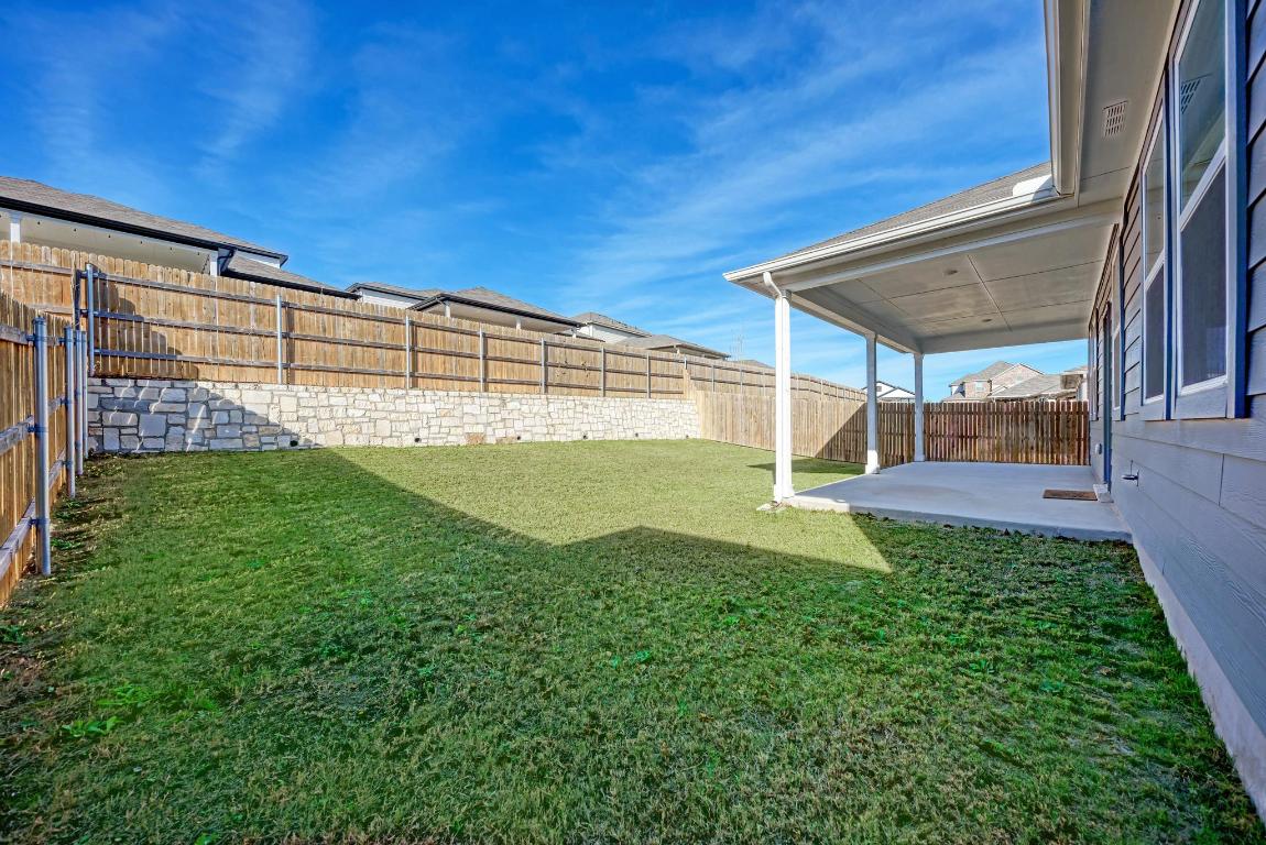 113 Rampart Loop Liberty Hill, TX 78642 - Photo 31 of 40 a view of yard with swimming pool
