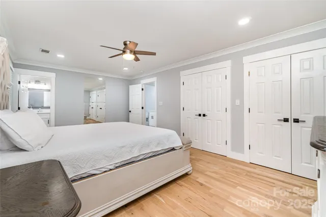 a view of a room with wooden floor