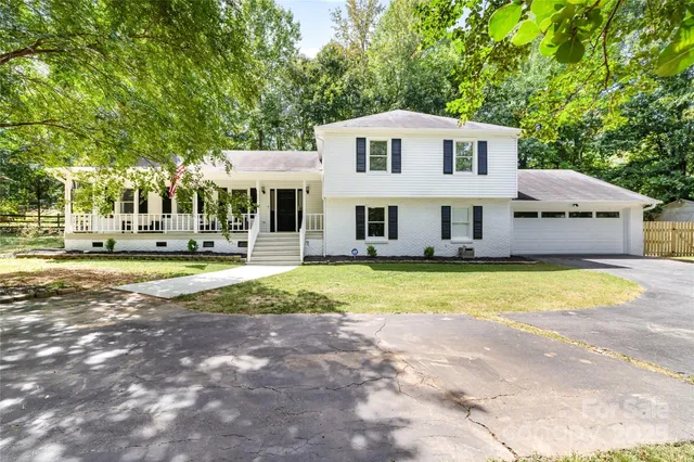 a view of a house with a swimming pool