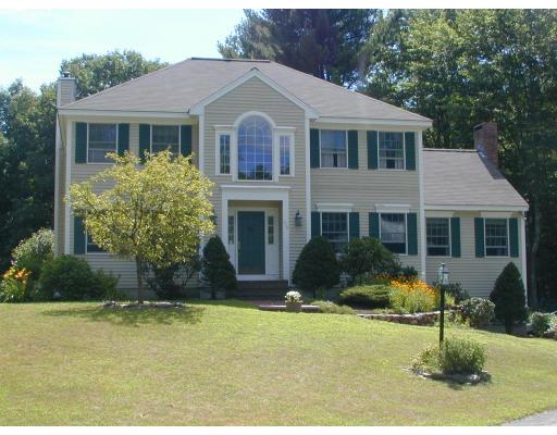 220 Joseph Road Boxborough, MA 01719 - Photo 1 of 9 a front view of a house with a yard