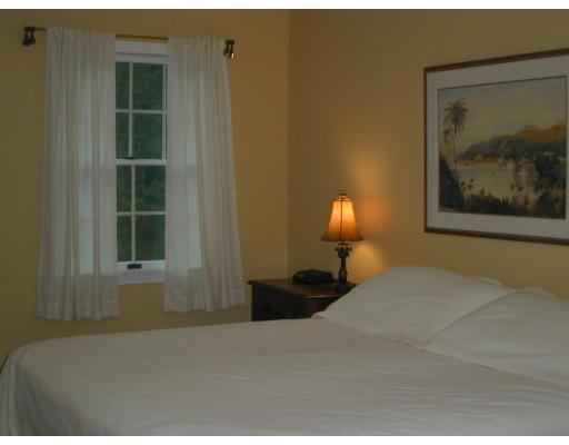 220 Joseph Road Boxborough, MA 01719 - Photo 5 of 9 a bedroom with a bed and a window