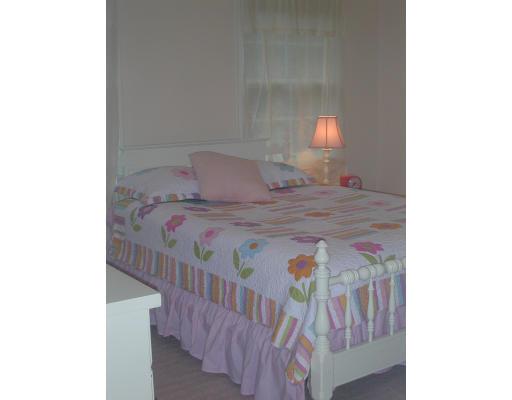 220 Joseph Road Boxborough, MA 01719 - Photo 6 of 9 a bedroom with a bed and window