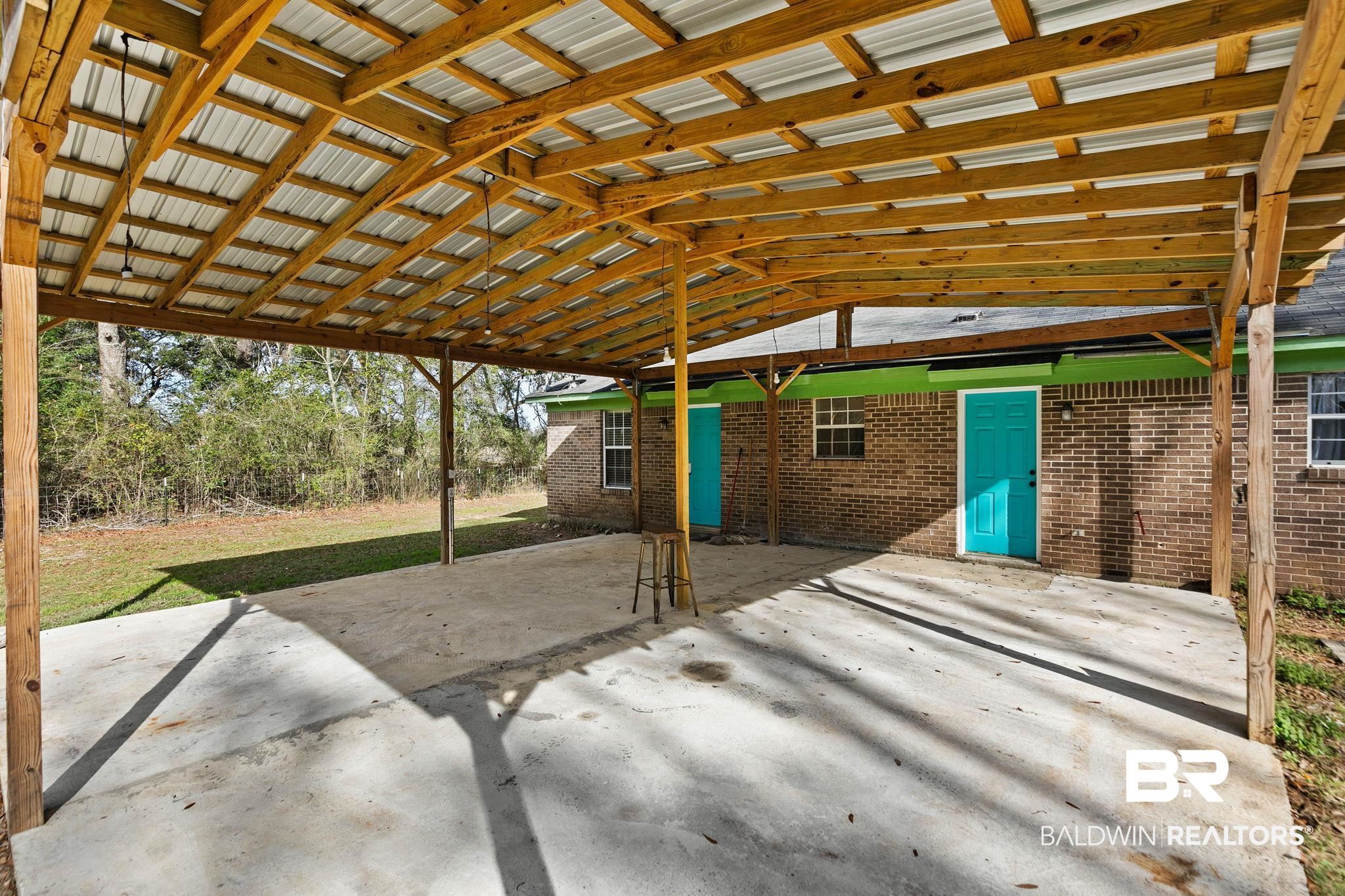 17366 Old Brady Road Bay Minette, AL 36507 - Photo 28 of 43 View of patio featuring a carport