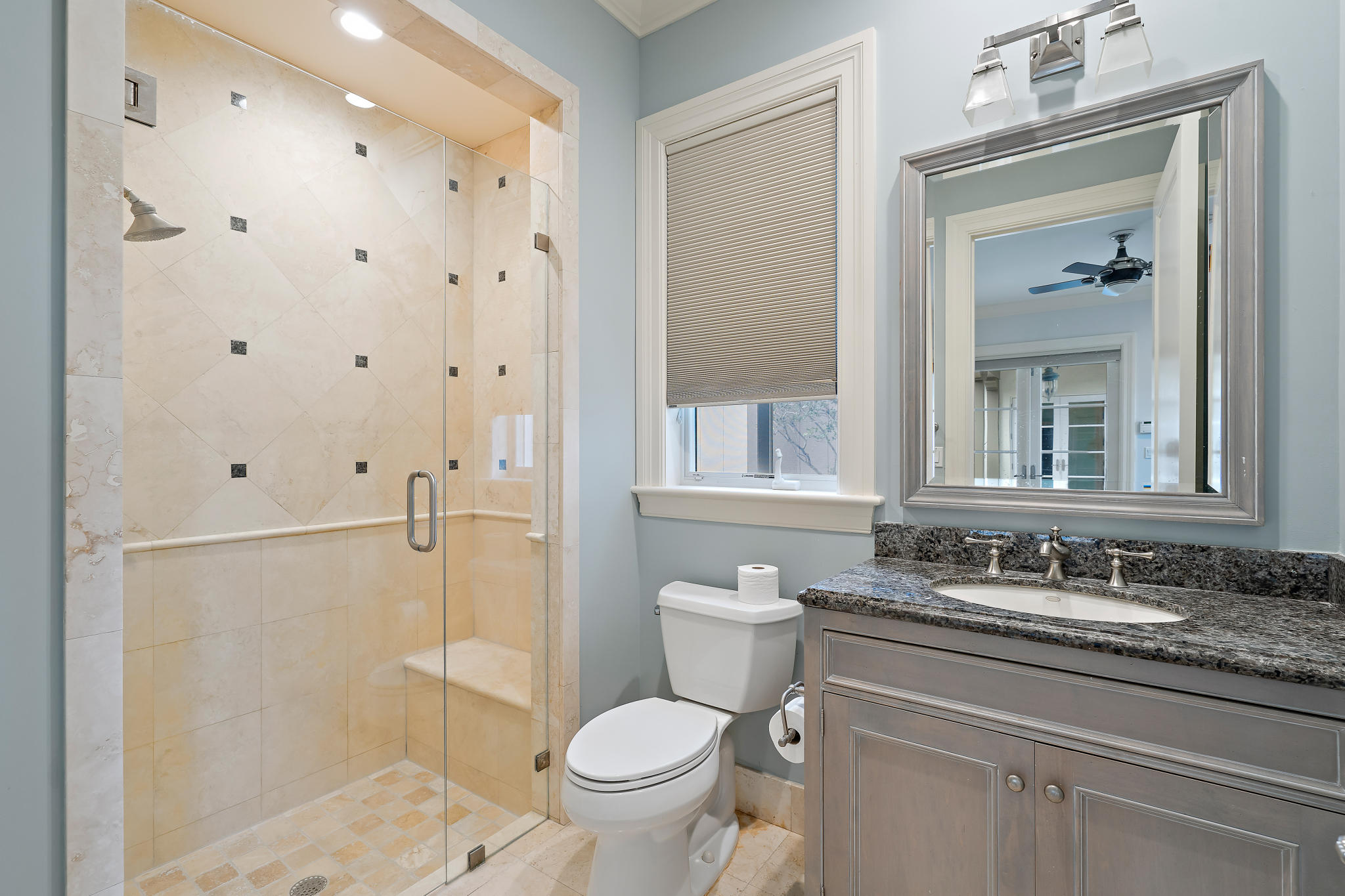 426 Red Hawk Drive Jupiter, FL 33477 - Photo 19 of 40 a bathroom with a sink toilet and shower