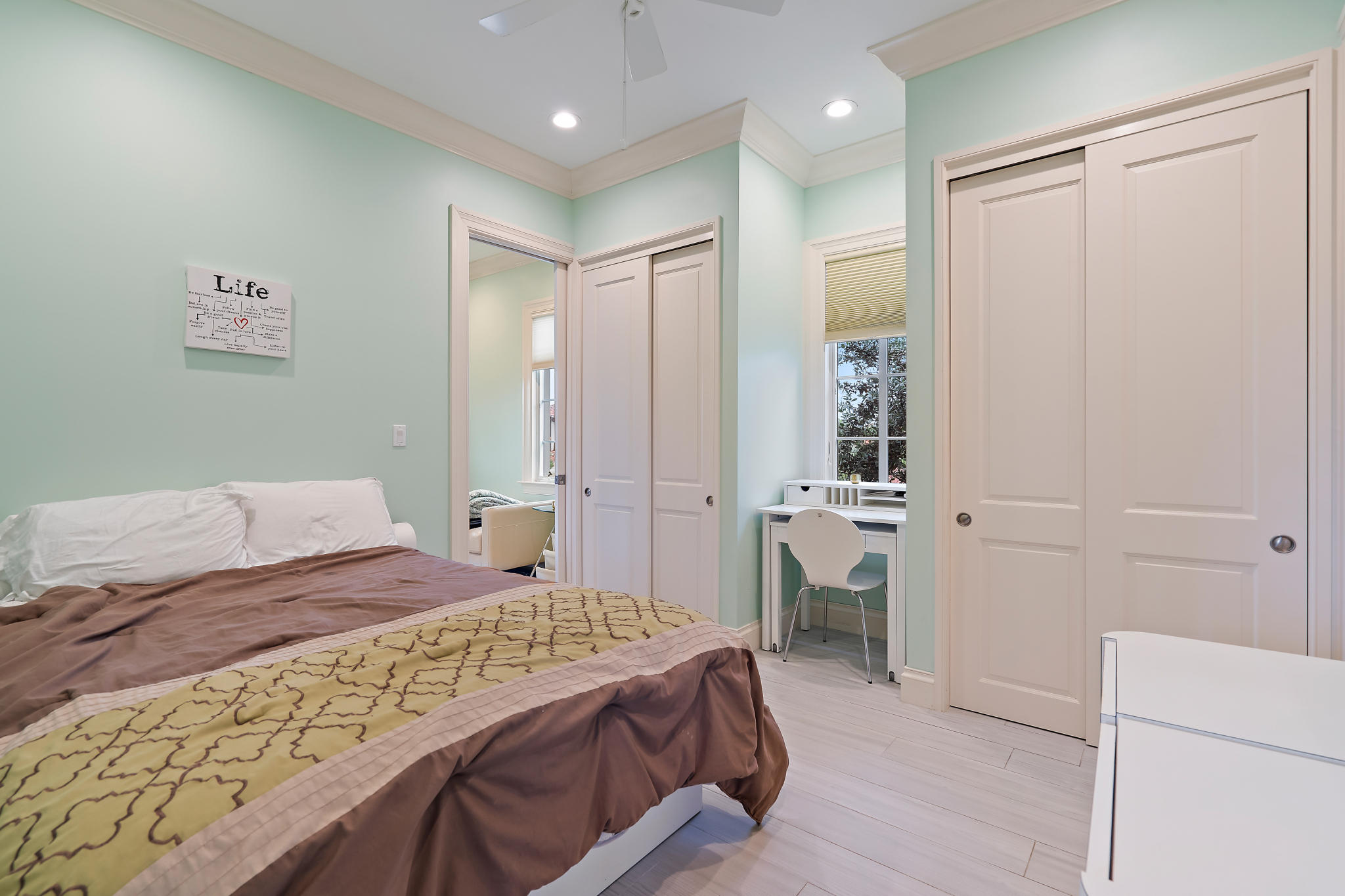 426 Red Hawk Drive Jupiter, FL 33477 - Photo 24 of 40 a bedroom with a bed and a view of bathroom