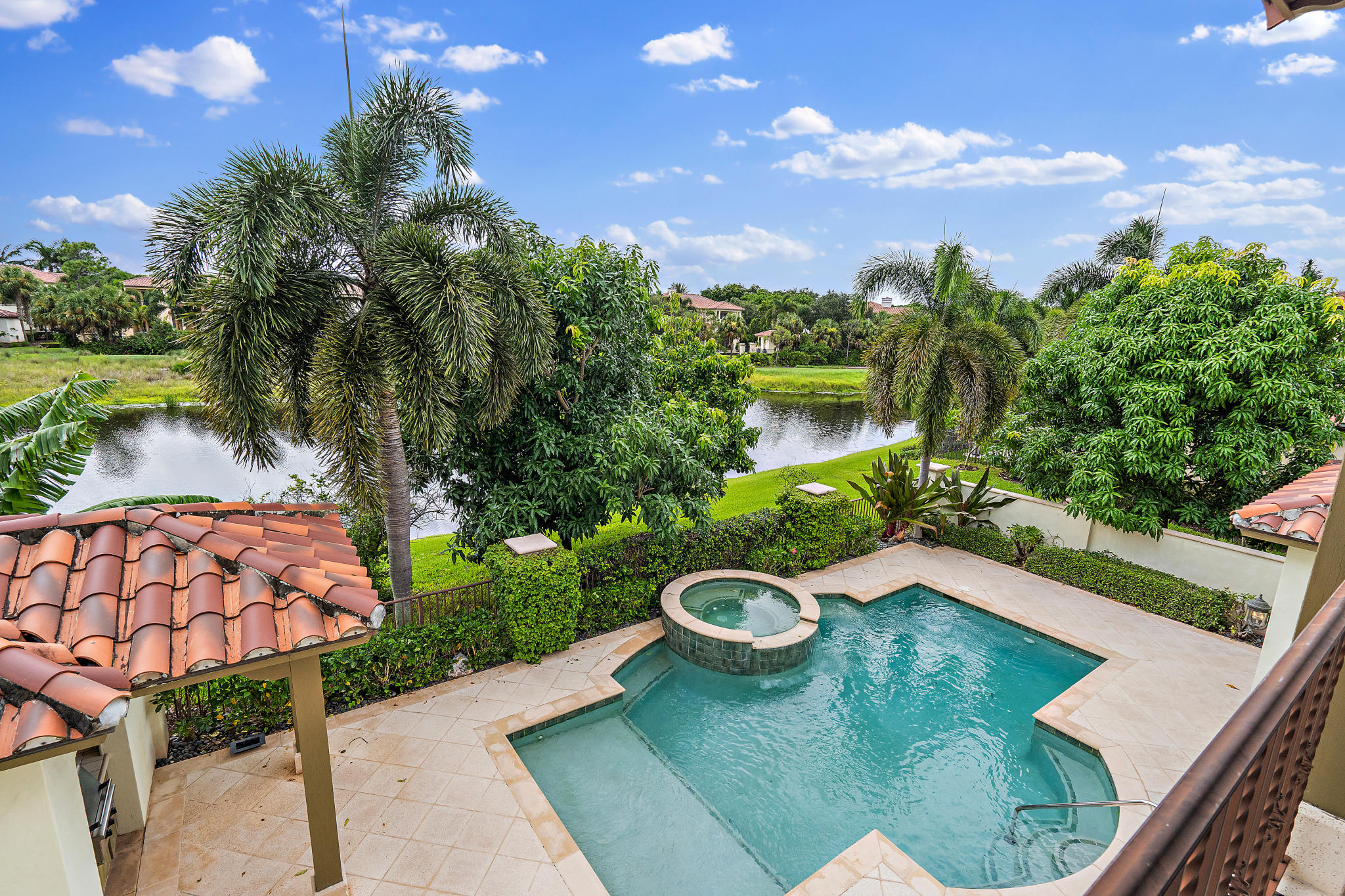 426 Red Hawk Drive Jupiter, FL 33477 - Photo 31 of 40 a view of a backyard with sitting area