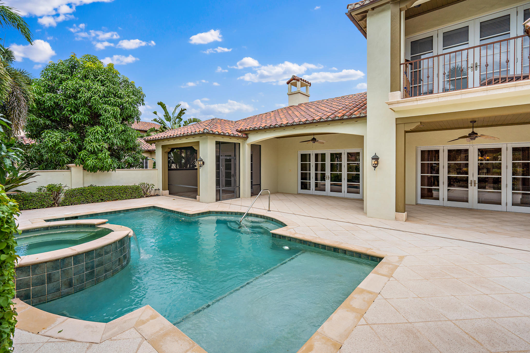426 Red Hawk Drive Jupiter, FL 33477 - Photo 35 of 40 front view of a house with swimming pool and porch