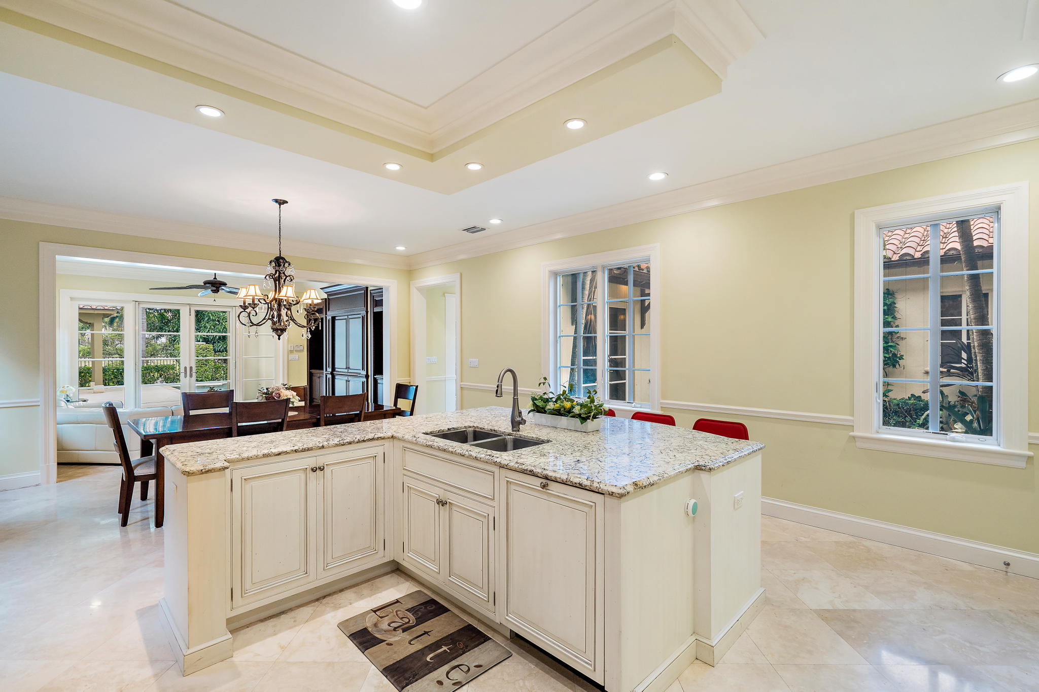 426 Red Hawk Drive Jupiter, FL 33477 - Photo 9 of 40 a kitchen with a sink stove and window