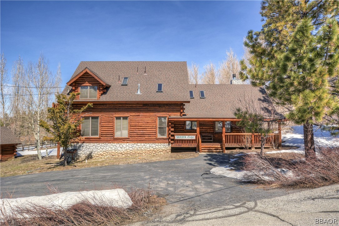 43574 Shasta Road Big Bear Lake, CA 92315 - Photo 1 of 37 a view of a house with a yard