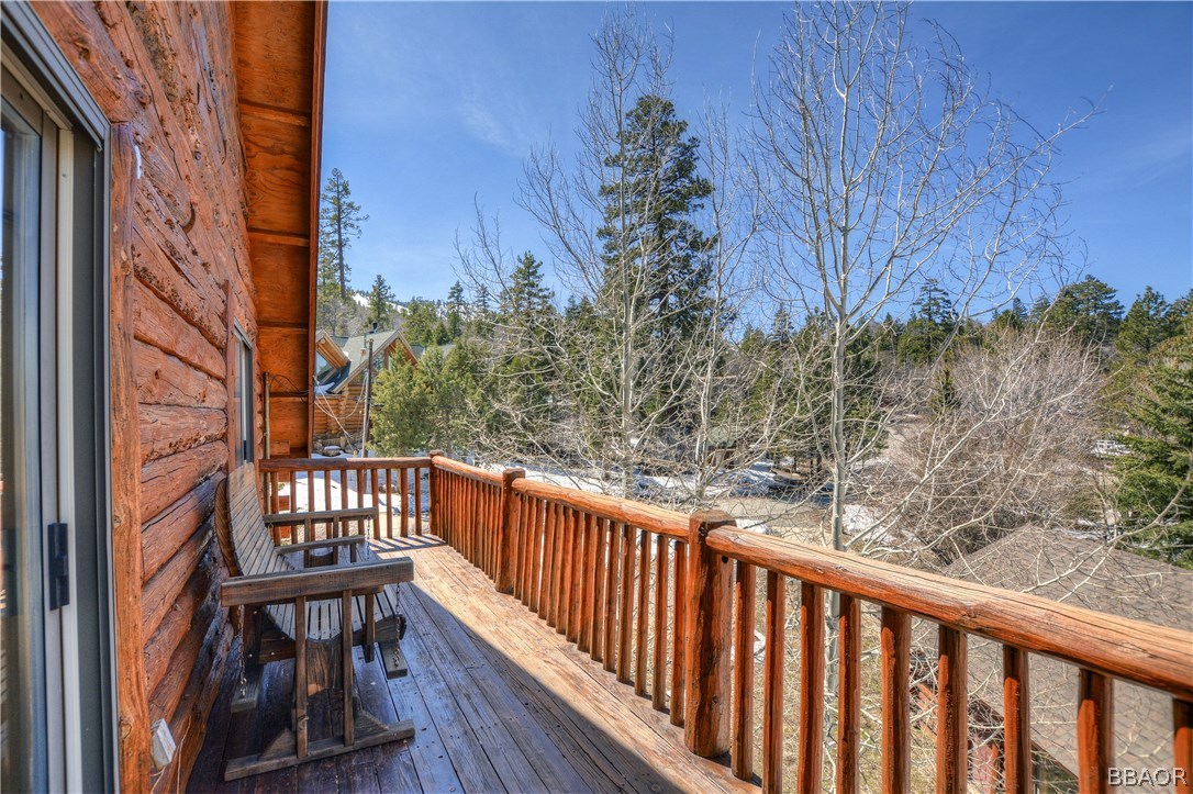 43574 Shasta Road Big Bear Lake, CA 92315 - Photo 26 of 37 a view of a balcony with wooden fence